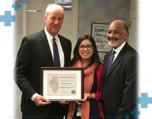 Dr. Frank Karkazis Accepting an Award